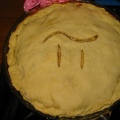 A pie with the symbol Pi carved into its crust.